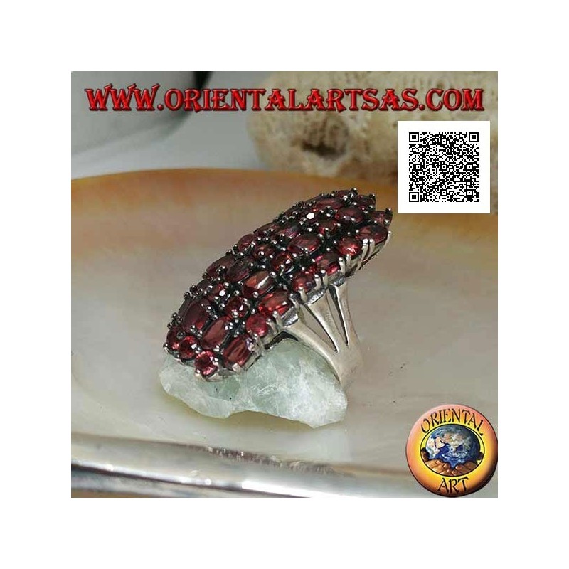 Silver ring with 31 natural garnets set oval and round to form a rectangle
