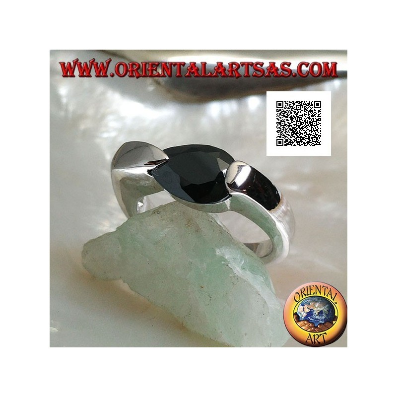 Rhodium silver ring with faceted drop-shaped spinel zircon hooked on the side