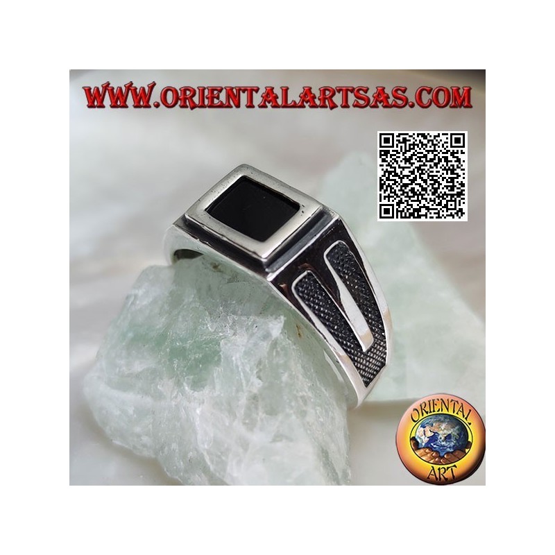 Silver ring with rectangular onyx edged and recessed V on the sides