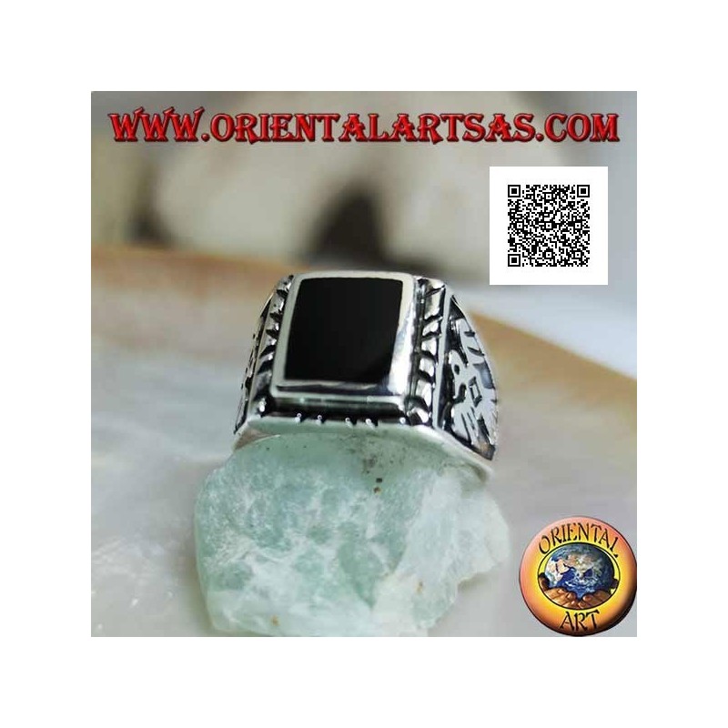 Silver ring with raised rectangular onyx and bas-relief eagle on the sides