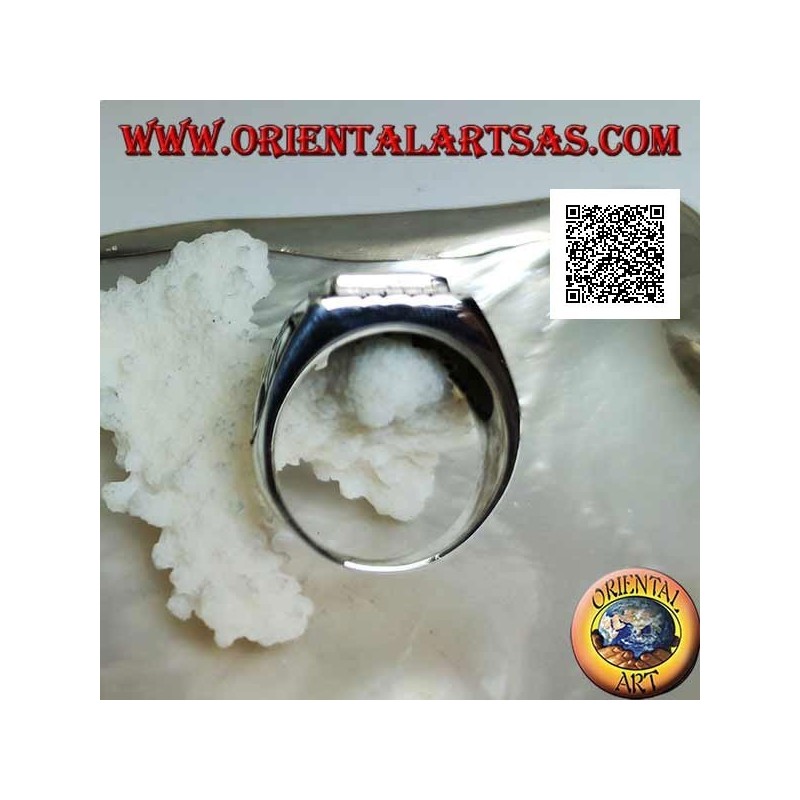 Anillo de plata con turquesa rectangular en relieve y águila en bajorrelieve a los lados