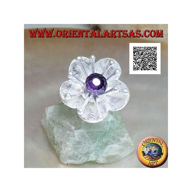 Flower-shaped satin silver ring with long pistils and faceted amethyst-colored zircon sphere