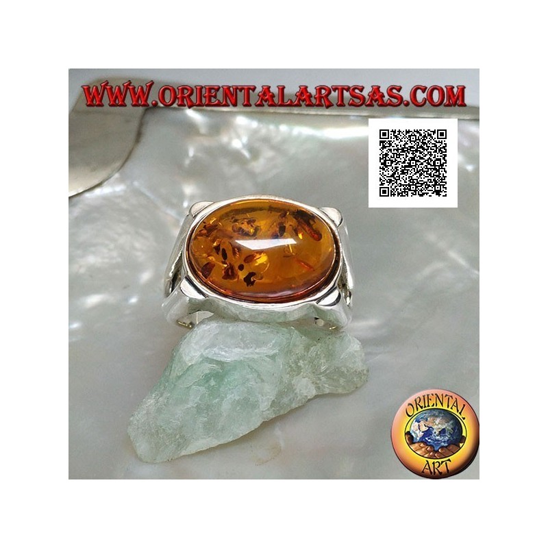 Silver ring with oval cabochon amber crosswise on smooth setting with lateral opening