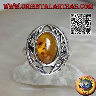 Silver ring with cabochon oval amber between two laurel branches