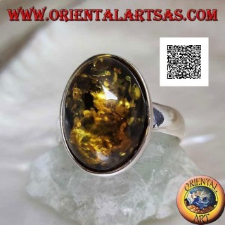 Silver ring with oval cabochon green amber on simple setting and smooth edge