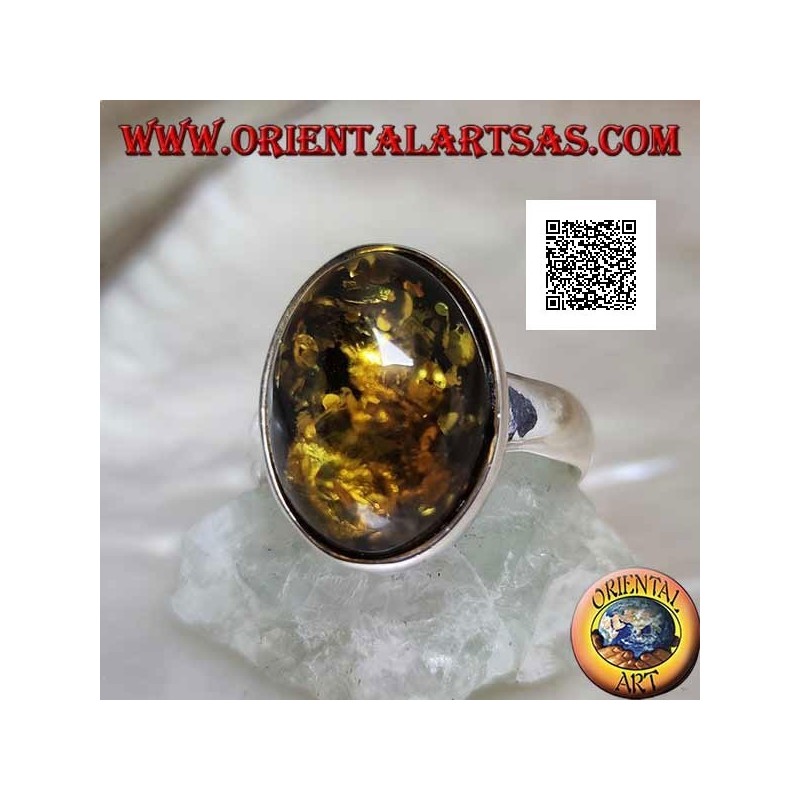 Silver ring with oval cabochon green amber on simple setting and smooth edge