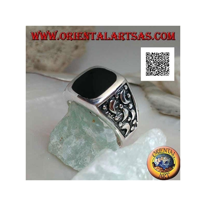 Silver ring with rounded rectangular onyx and moons cut on the sides