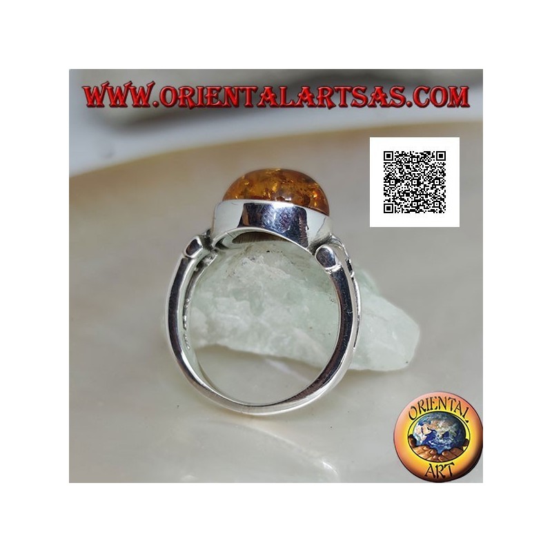 Bague en argent avec cabochon ovale ambre en croix avec trou triangulaire allongé