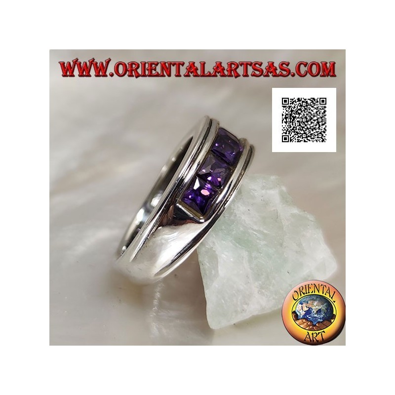 Anello in argento a fascia rodiato con una fila di zirconi quadrati color ametista