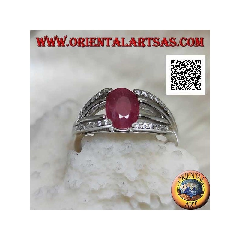 Silver ring with natural oval ruby set with two lines of zircons and two of silver