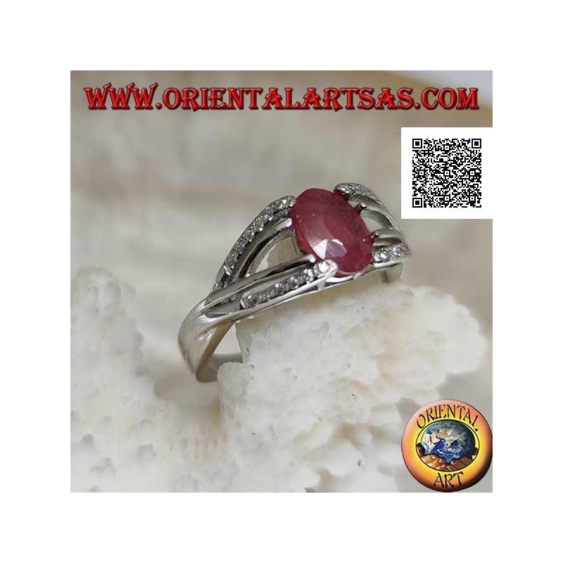 Silver ring with natural oval ruby set with two lines of zircons and two of silver
