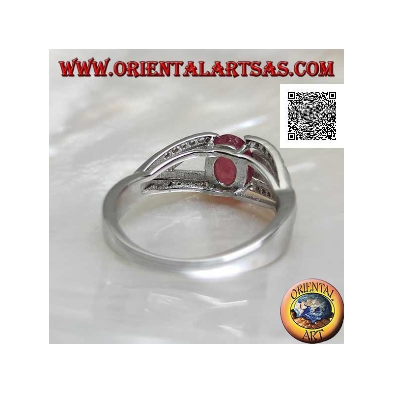Silver ring with natural oval ruby set with two lines of zircons and two of silver