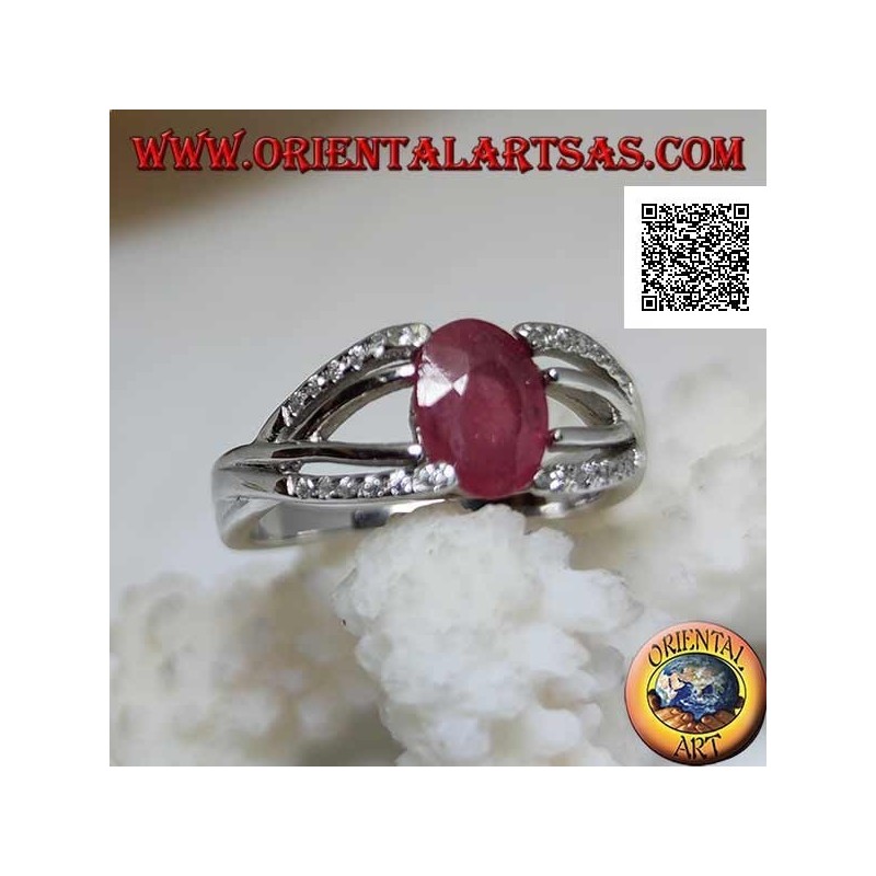 Silver ring with natural oval ruby set with two lines of zircons and two of silver