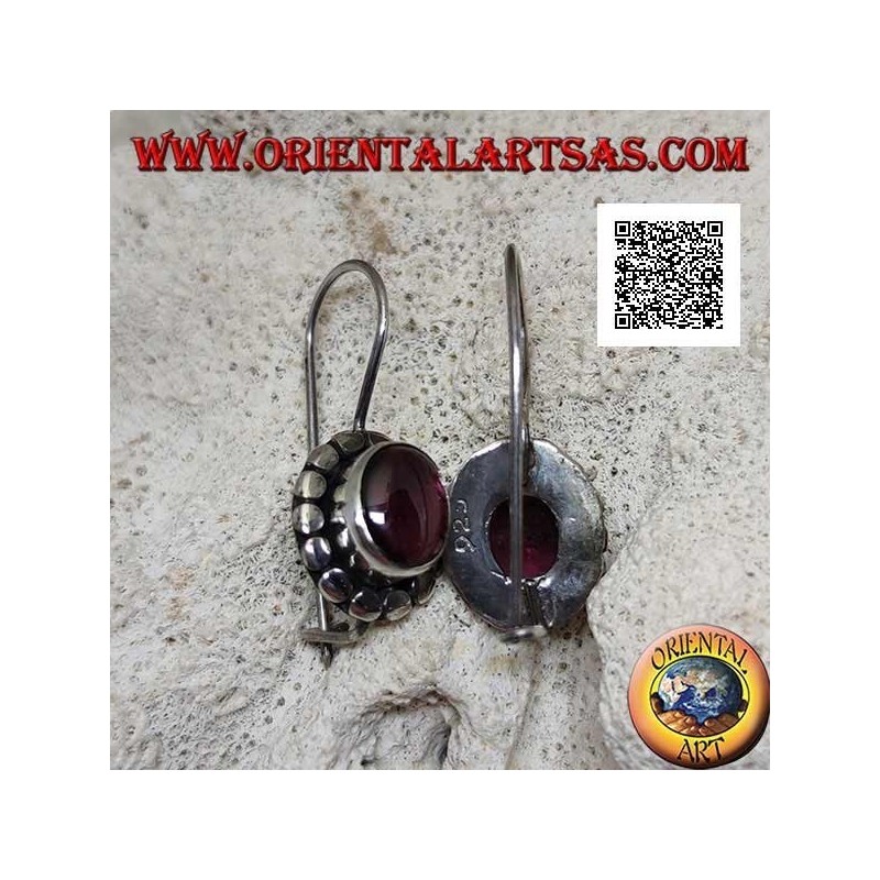 Silver earrings with oval cabochon natural garnet surrounded by disks with silver studs