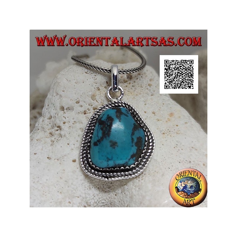 Ciondolo in argento con turchese antico tibetano di forma irregolare contornato da intreccio