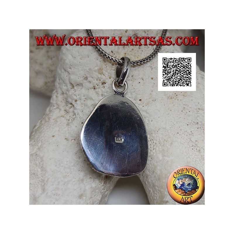 Colgante de plata con turquesa tibetana antigua de forma irregular rodeada de tejido