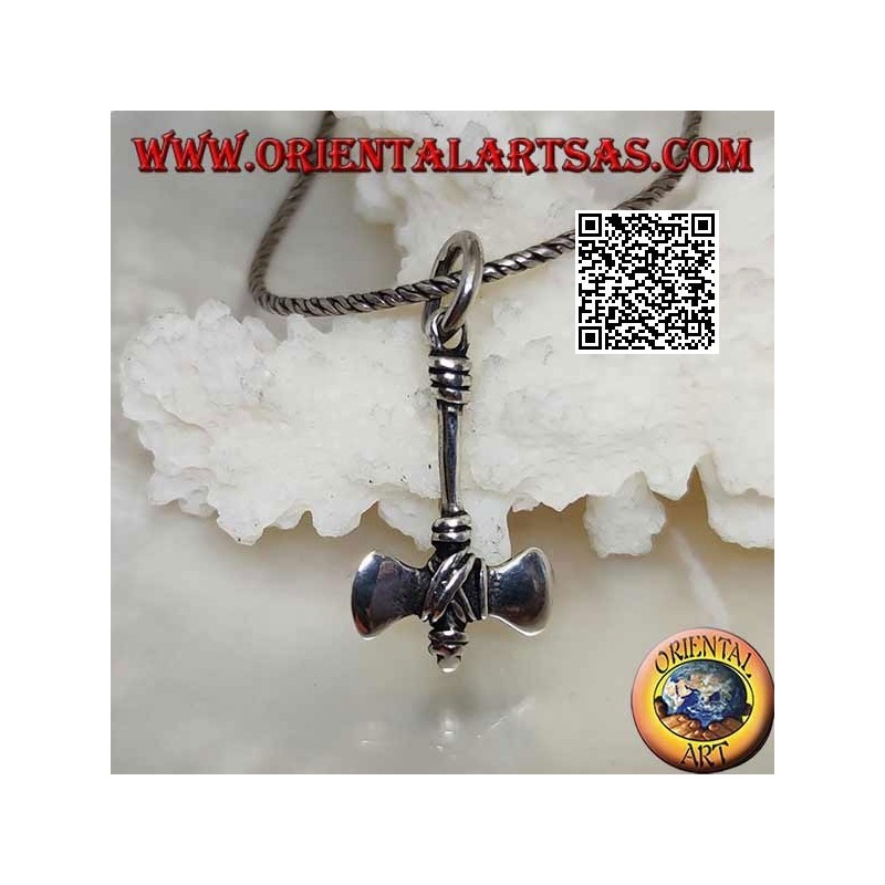 Silver pendant in the shape of a double ax of primitive men