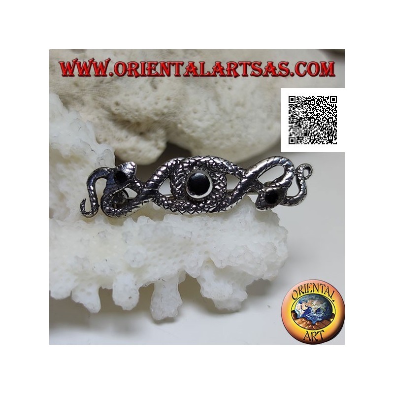 Silver brooch in the shape of two snakes intertwined with central onyx and on the eyes