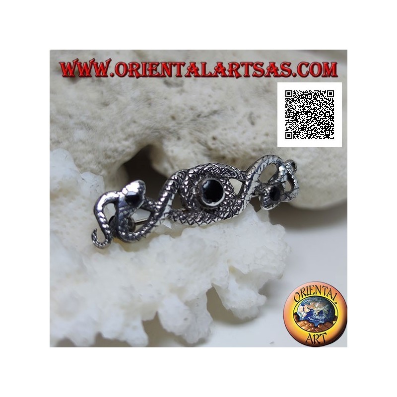 Silver brooch in the shape of two snakes intertwined with central onyx and on the eyes