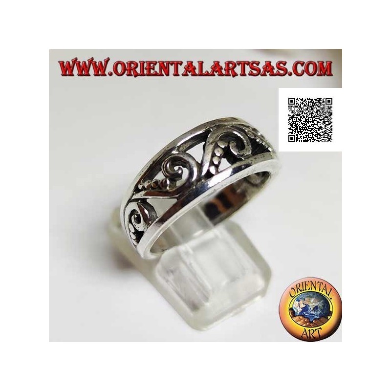 Growing ring in silver with openwork pattern of curves and discs