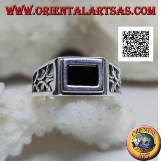 Silver ring with rectangular onyx edged and openwork decoration of semicircles on the sides