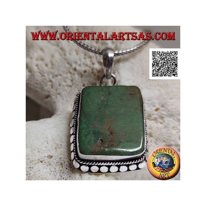 Silver pendant with large rectangular Tibetan antique turquoise surrounded by studs