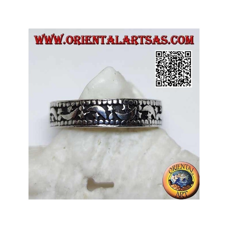 Bague en argent avec lunes et étoiles sur fond creux