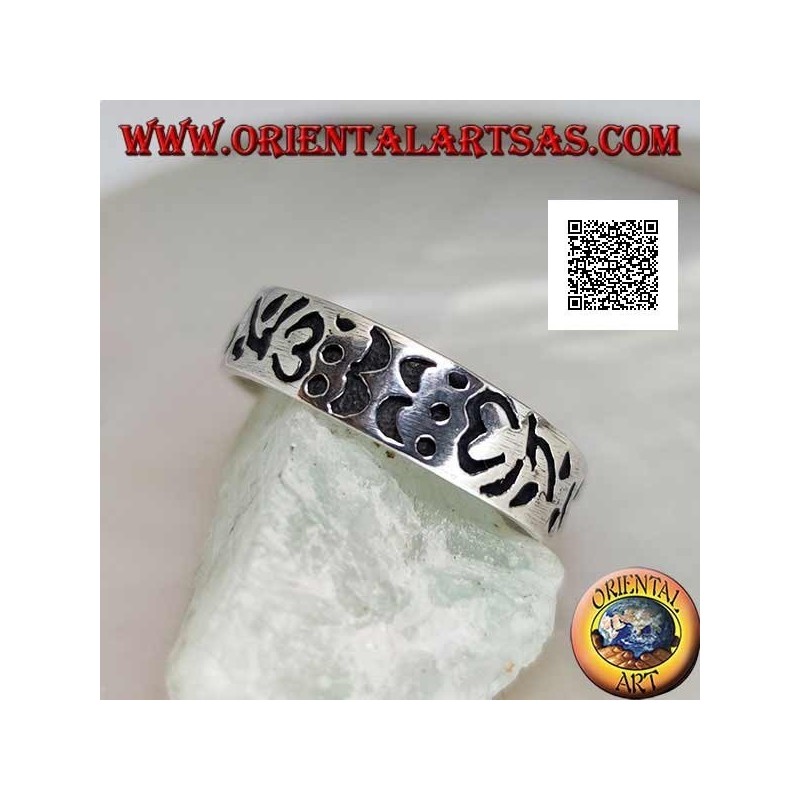 Silver ring with Om (Tibetan mantra) and engraved floral decorations