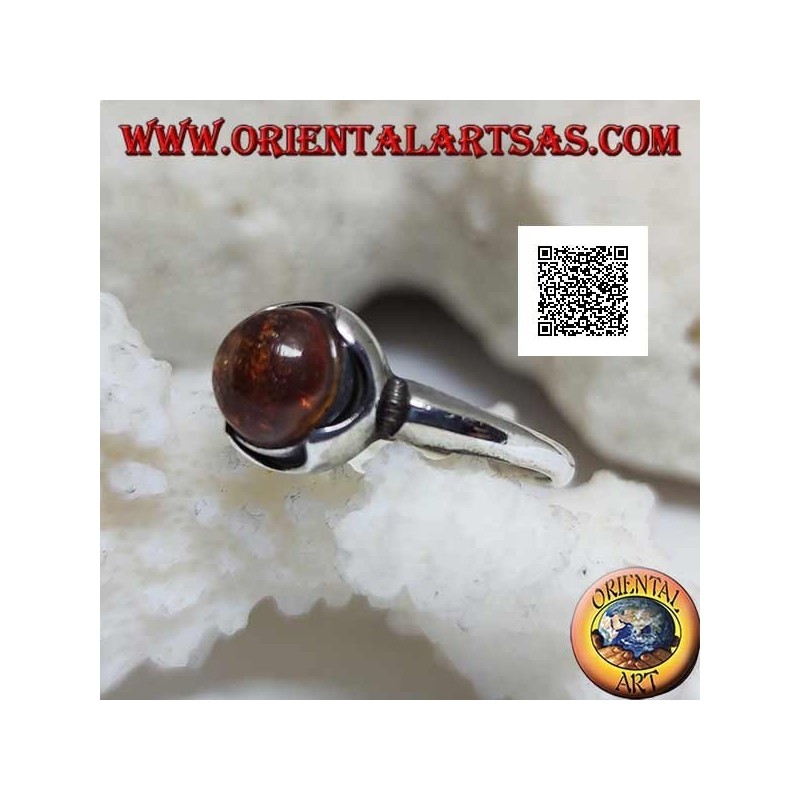 Silver ring with round cabochon amber surrounded by semicircles on a smooth setting