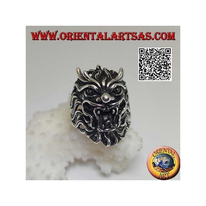 Silver ring in the shape of the face of an evil demon