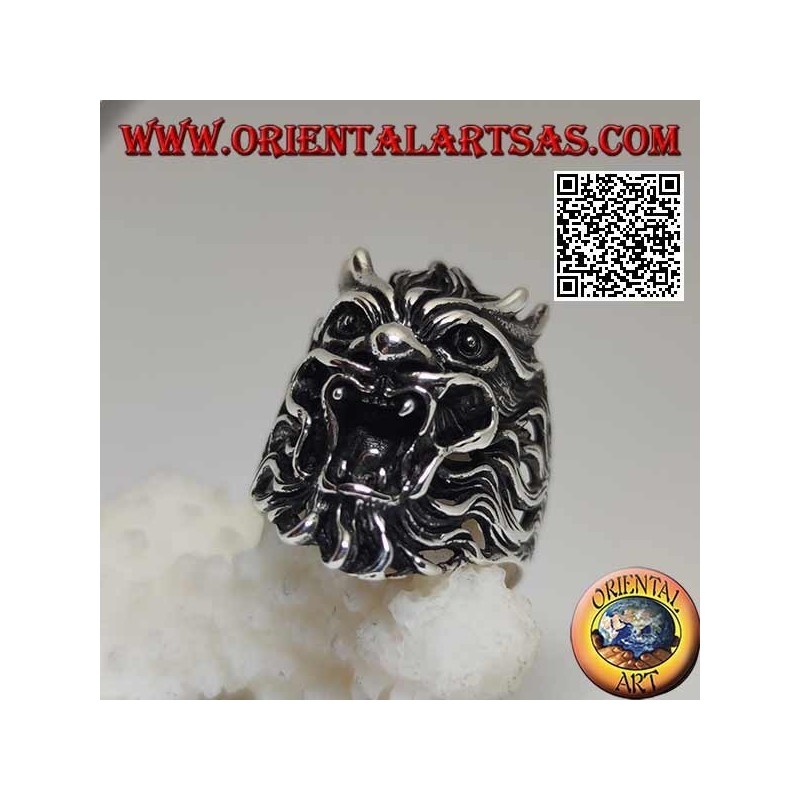 Silver ring in the shape of the face of an evil demon