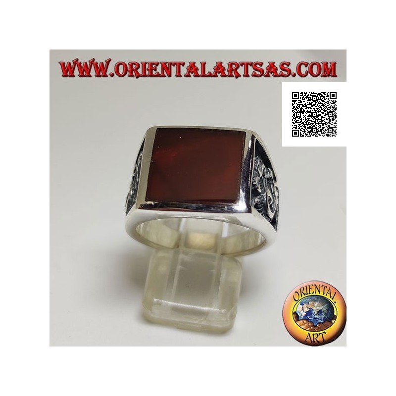 Silver ring with square carnelian and profile dragon in bas-relief on the sides