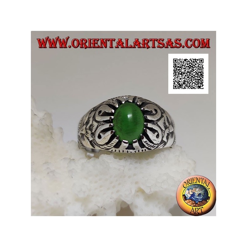 Silver ring with cabochon oval green agate set with claws and embossed floral decorations on the sides