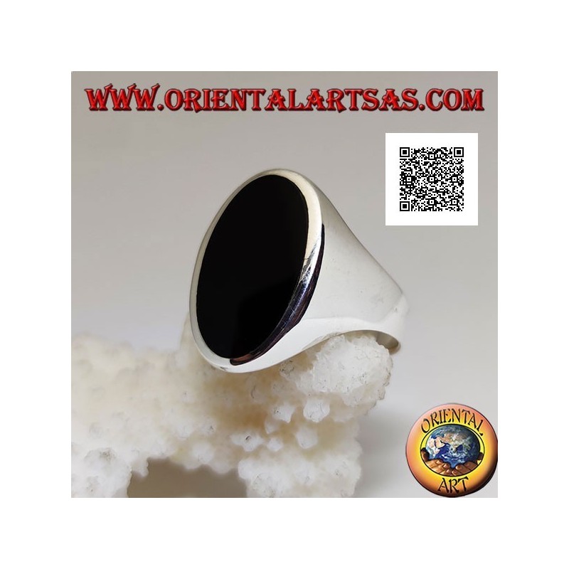 Silver ring with oval onyx elongated flush with the edge on a smooth frame