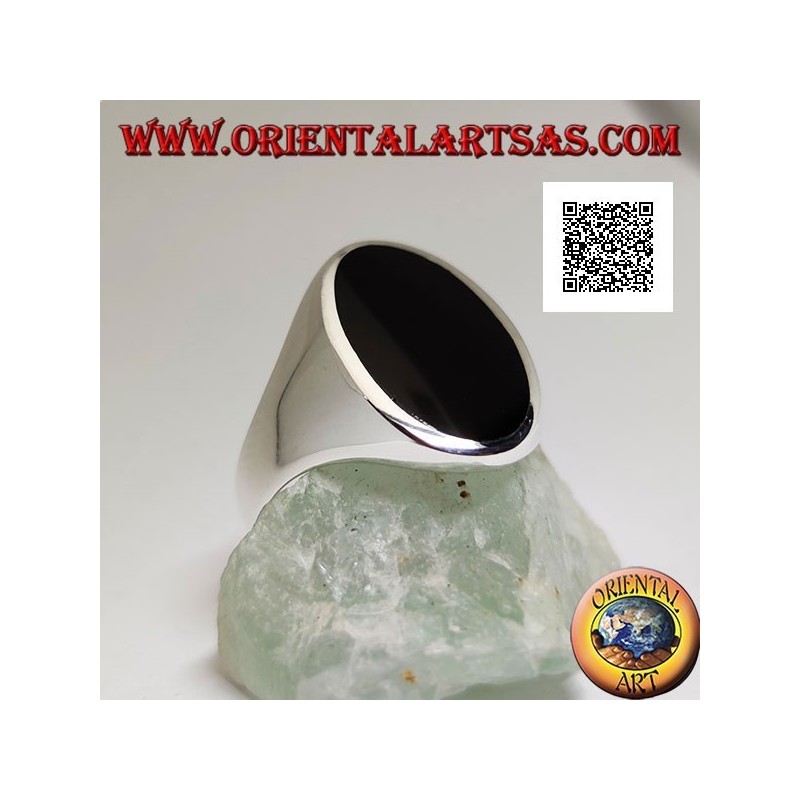 Silver ring with oval onyx elongated flush with the edge on a smooth frame