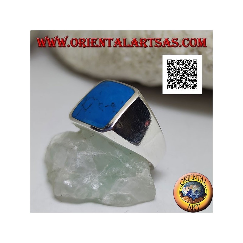 Anillo de plata con turquesa rectangular biselada engastada al ras con el borde sobre un marco liso