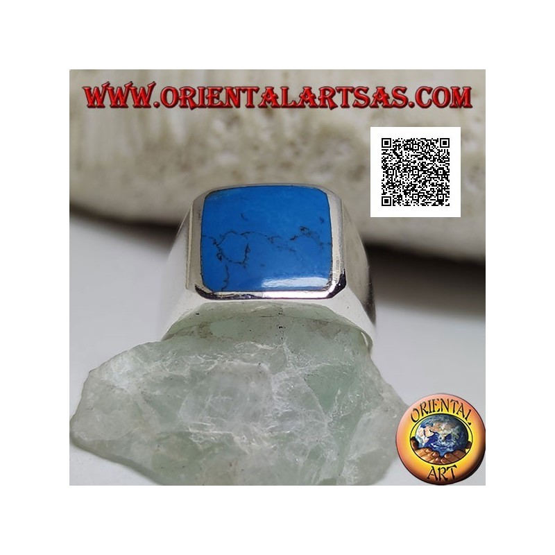 Anello in argento con turchese rettangolare smussato incastonato a filo bordo su montatura liscia