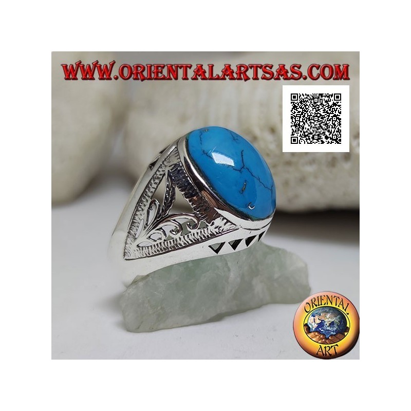 Silberring mit ovalem Cabochon-Türkis und floralen und dreieckigen Verzierungen an den Seiten