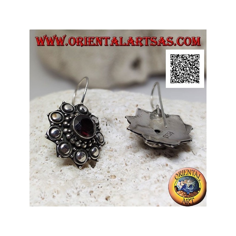 Silver flower pendant earrings with faceted round garnet surrounded by balls and discs