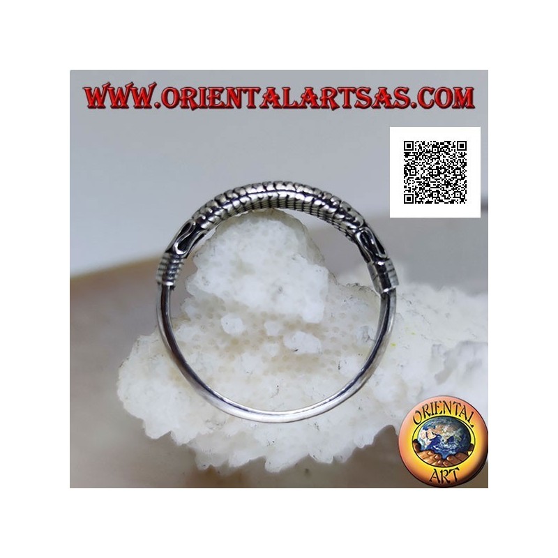 Silver ring with an oriental style serpentine and interweaving