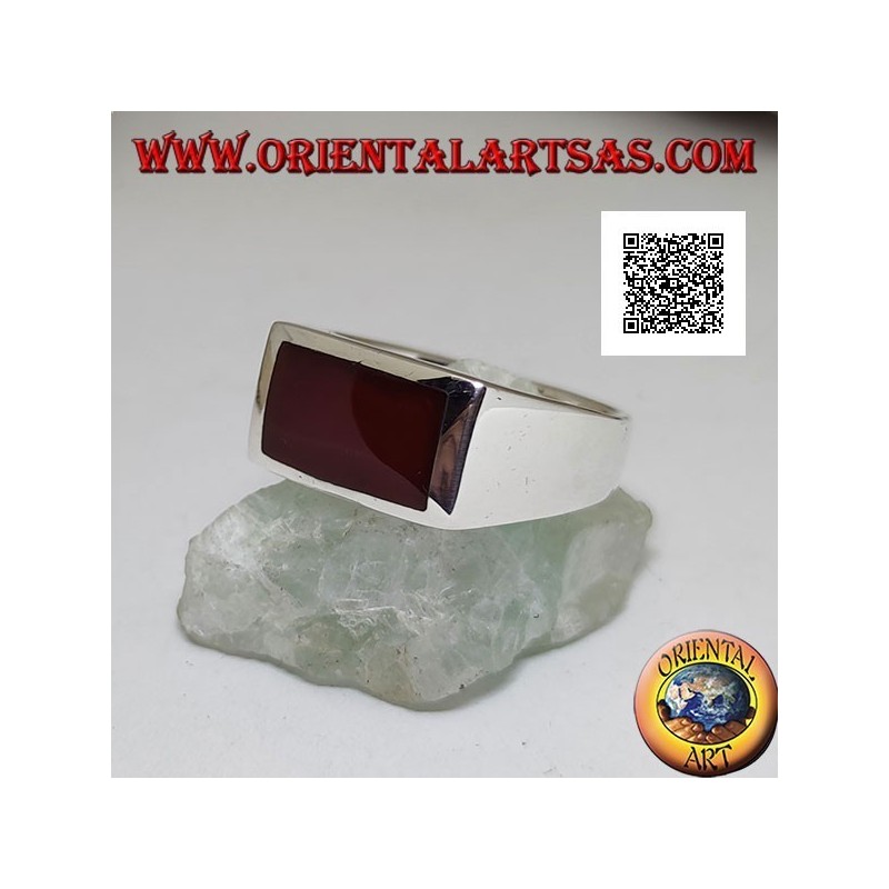 Silver ring with horizontal rectangular carnelian flush with the edge on a smooth setting