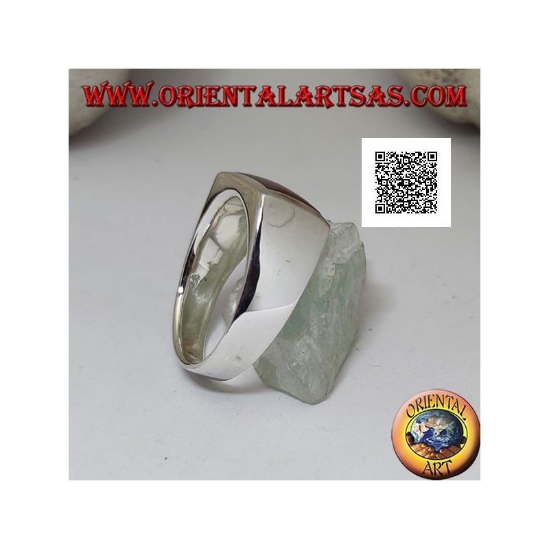Silver ring with horizontal rectangular carnelian flush with the edge on a smooth setting