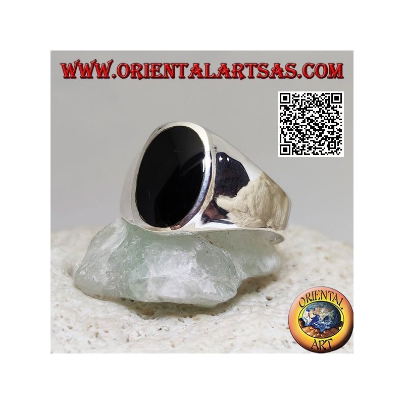 Silver ring with flat oval onyx flush with the edge