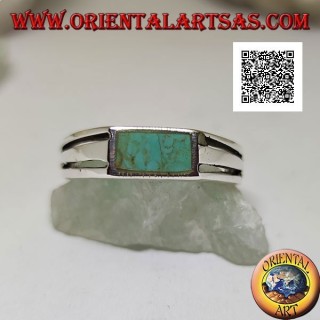 Silver ring with rectangular turquoise flush with the edge and two horizontal perforated lines on the sides