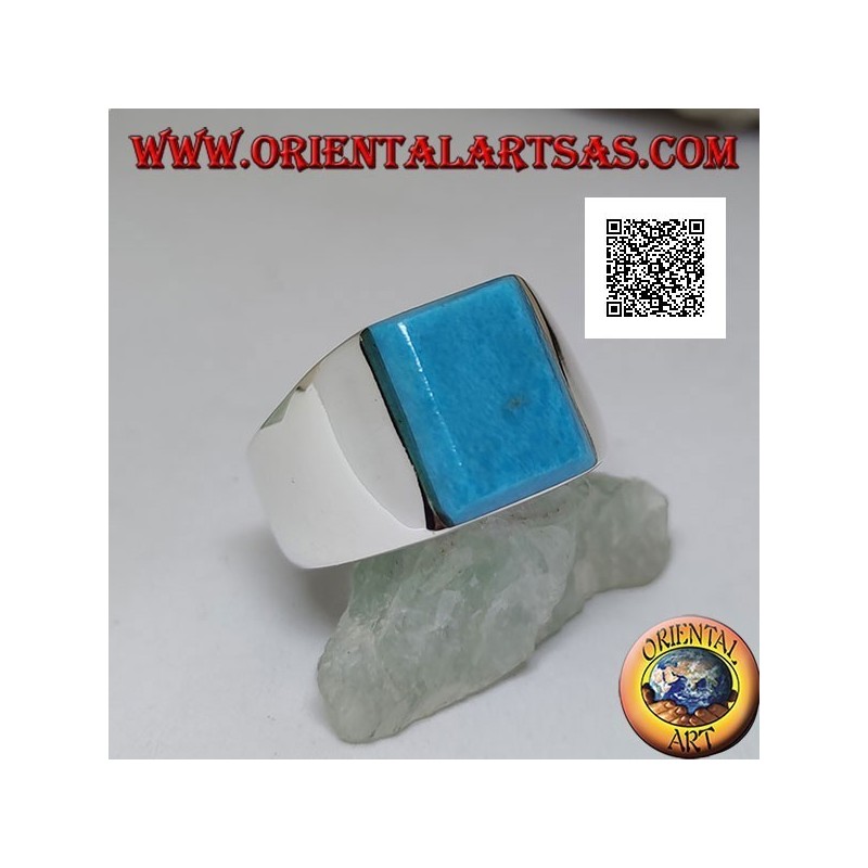 Anillo de plata con turquesa rectangular en relieve sobre marco liso