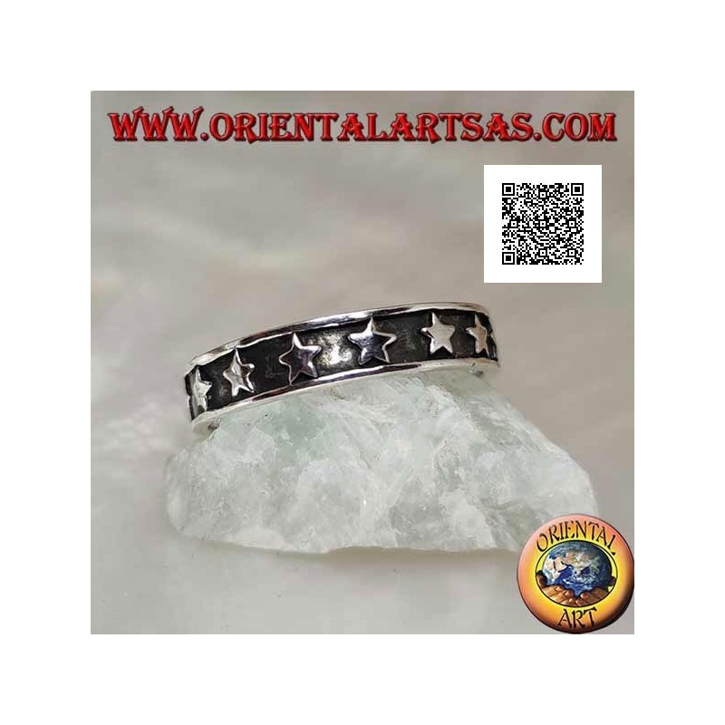 Silver ring with a smooth bas-relief row of stars