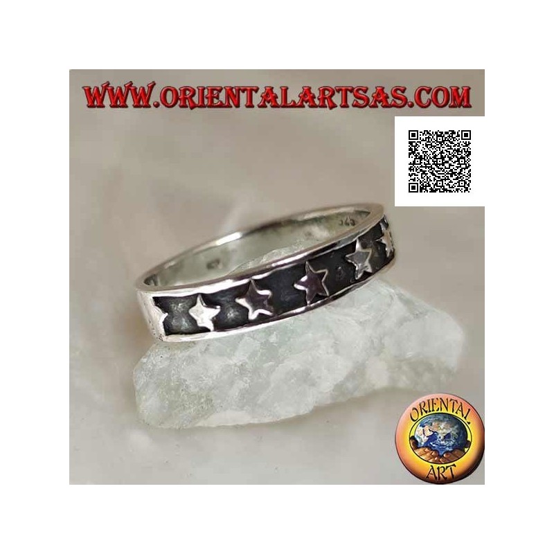 Silver ring with a smooth bas-relief row of stars