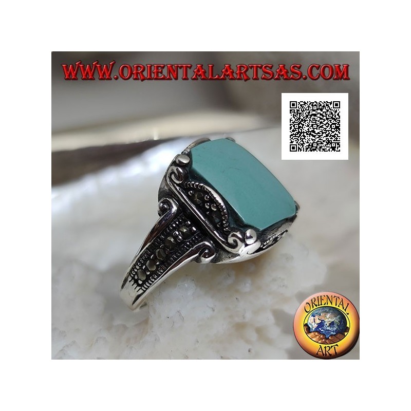 Silver ring with square cabochon turquoise in wavy frame and marcasite around and on the sides