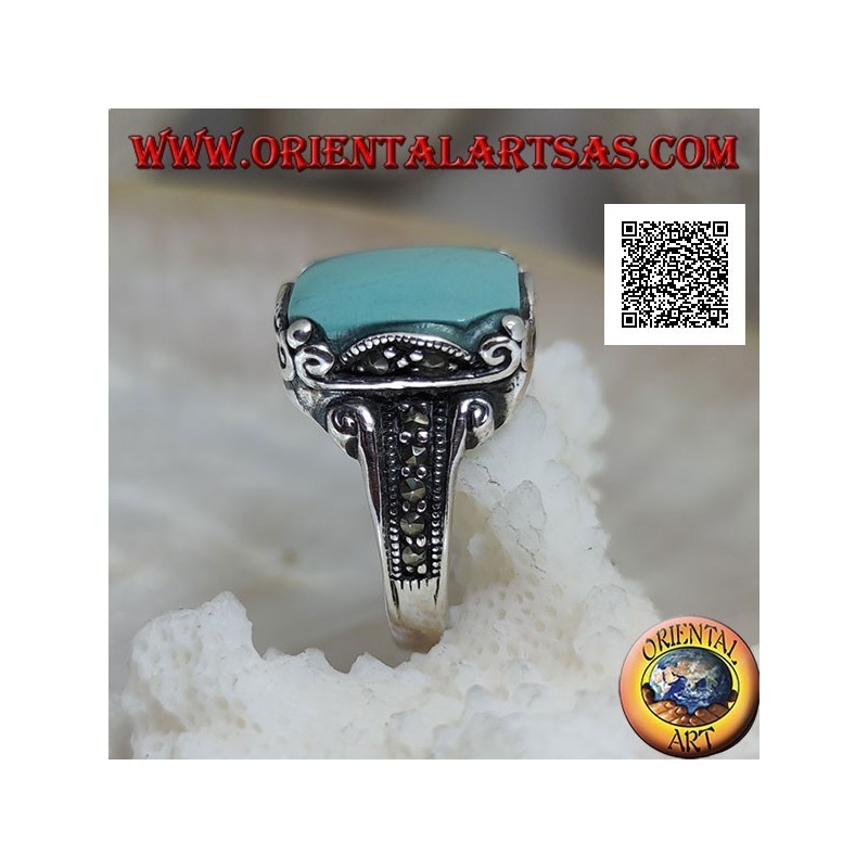 Silberring mit quadratischem Cabochon-Türkis in gewelltem Rahmen und Markasit um und an den Seiten