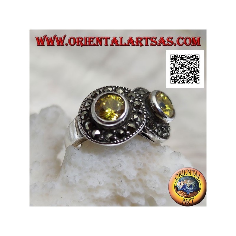 Anello in argento con due topazi gialli tondi in due cerchi tempestati di marcassite intersecati tra loro